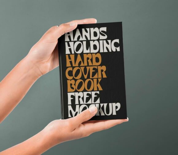 Hands holding hardcover book mockup