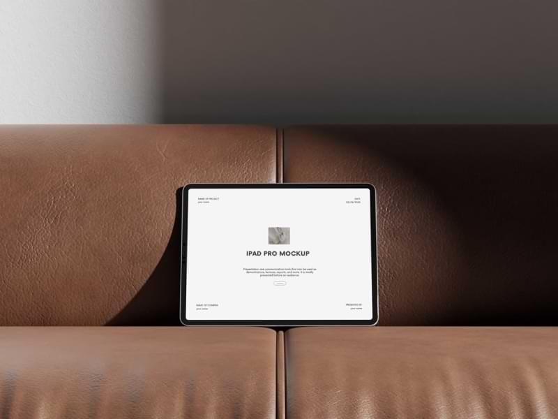 iPad Pro on Leather Sofa Mockup